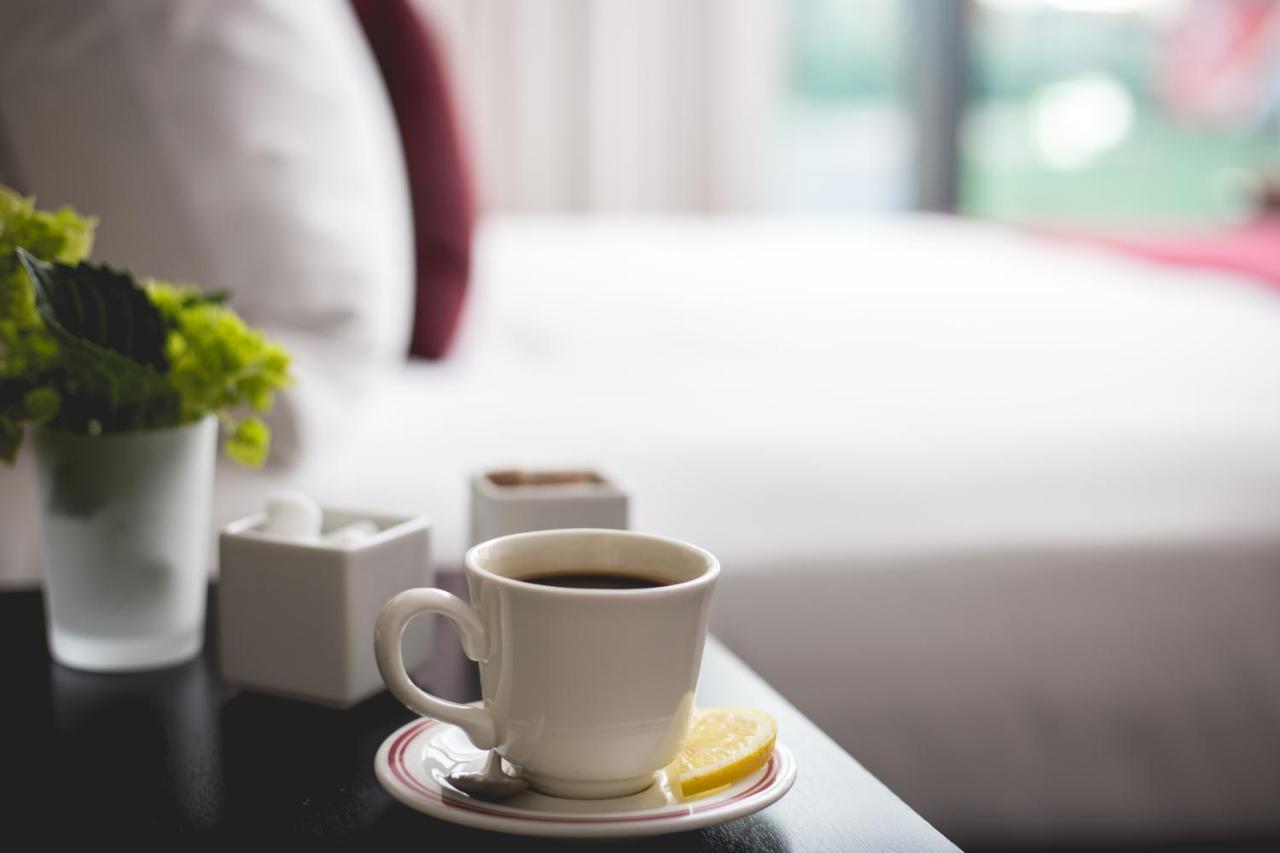 Hotel Commonwealth Boston Eksteriør billede A cup of coffee